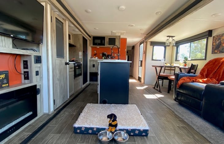 Pet friendly.   Radio is bluetooth-ready.  Speaker zones allow for interior and exterior audio.  TV can be easily located to exterior position with built-in speakers.