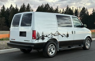 The Timber Den — Cozy Cabin Camper with Solar