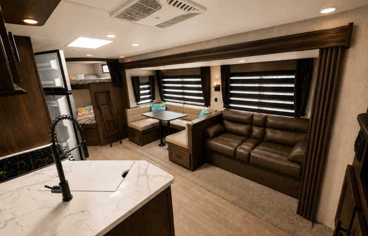 The 5 O'Clock Somewhere features a spacious and beautifully appointed living room with plenty of seating, making it the perfect place to relax, unwind, and spend quality time with family and friends.