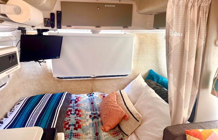 Converts into a dinette that seats 4. Storage underneath when left as a double sleeper. Memory foam mattress topper for added comfort.