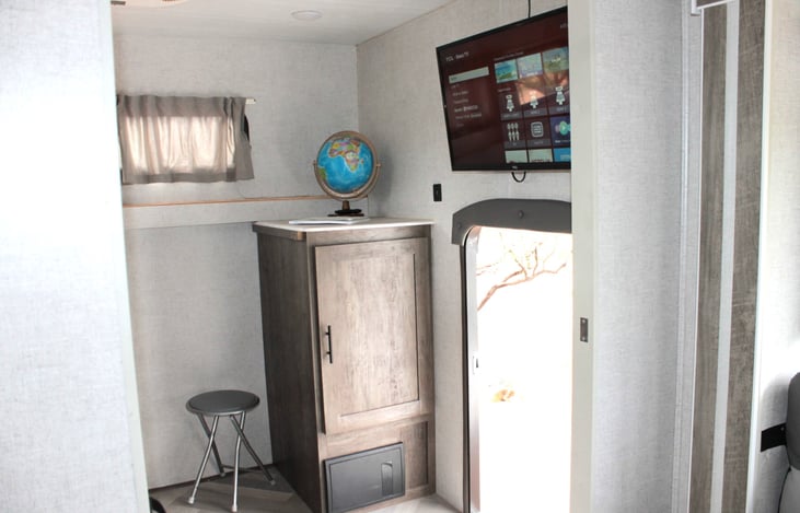 lounge area or work/sleep space door closes to make a separate room and also has a small outside door