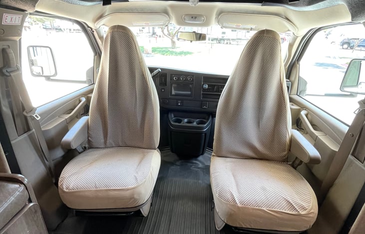 Added bonus, driver and passenger seat swivel chairs.