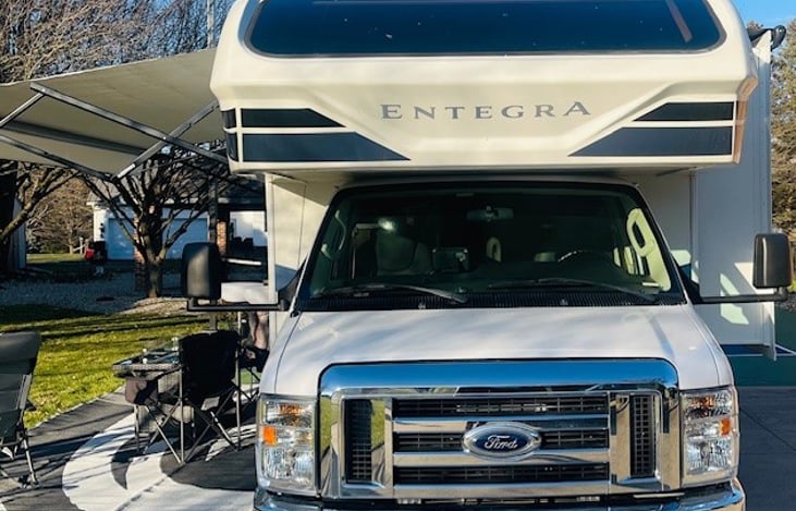 Beautiful Chrome Grille with Bunk Window & Power Shade