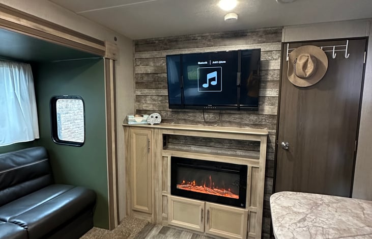 Electric fireplace/heater and tv which controls Bluetooth inside and outside