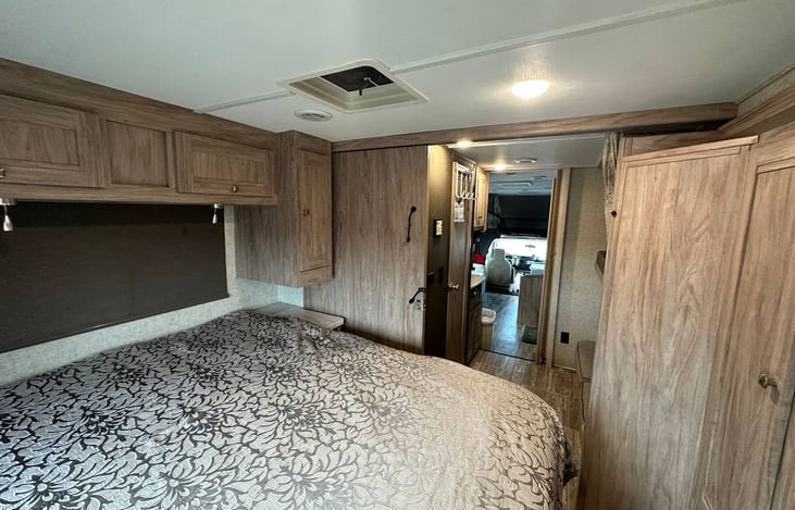 Queen bed, bathroom door