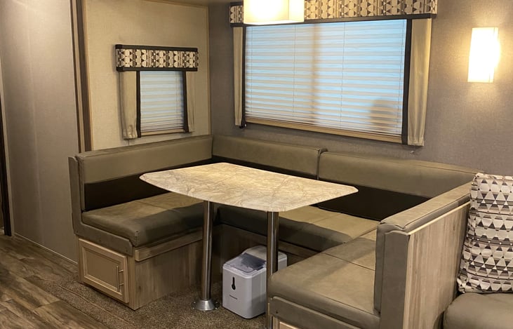 Table pulls down into bed