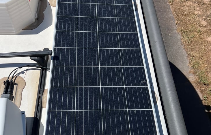 Solar panel keeps dual batteries charged for days while dry camping