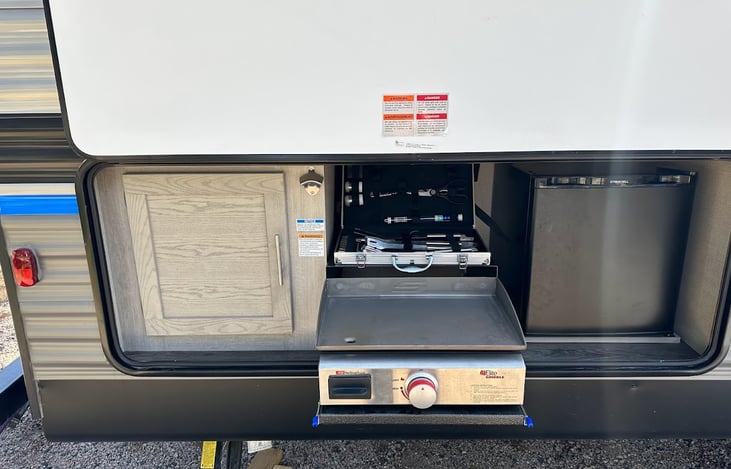 Outdoor kitchen with mini fridge