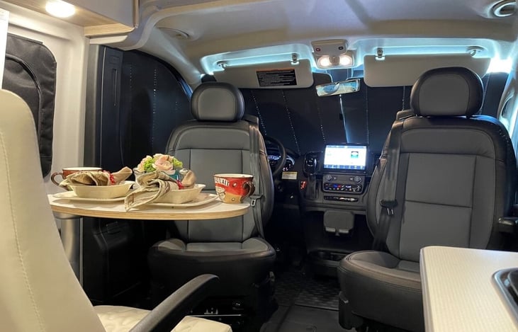 With the seats positioned to face each other and the table at the center, it's an inviting and social area where memories are made and shared.