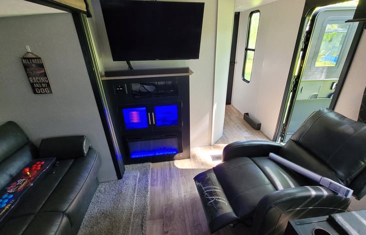 50" LCD TV with surround sound and blu-ray player is mounted on fully articulating mount - meaning it can tilt and rotate to virtually any angle making it easy to see from any seat.