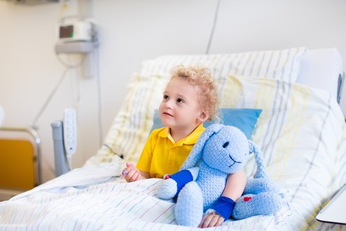 Child In Hospital Bed