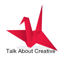 Talk About Creative logo