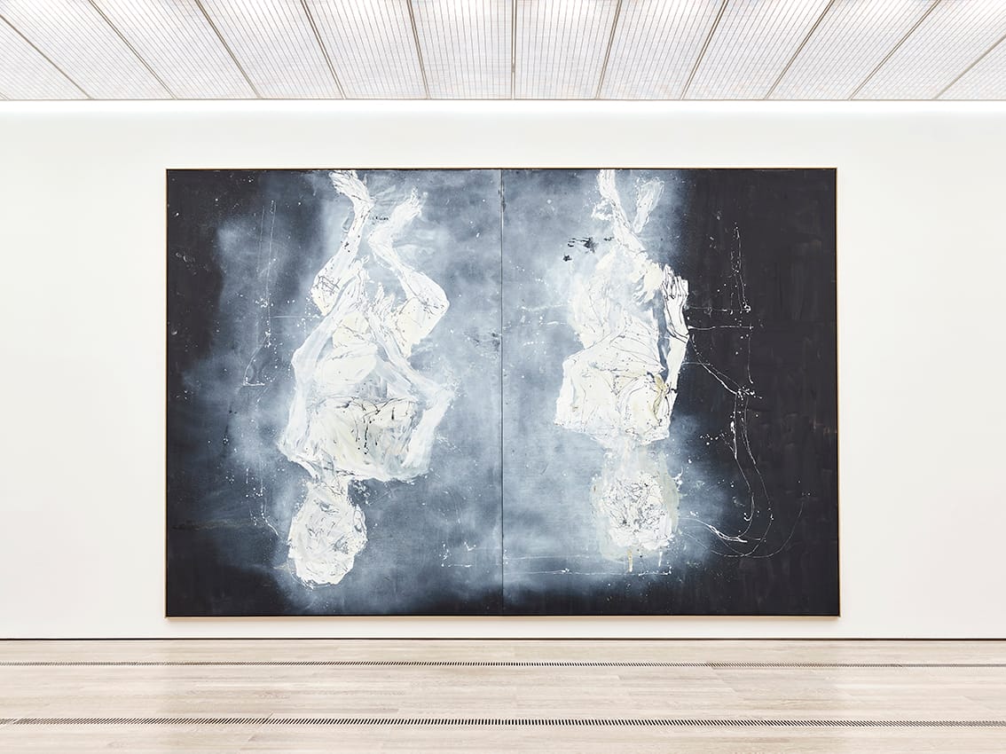 Baselitz Gemälde von zwei Menschen an der Wand