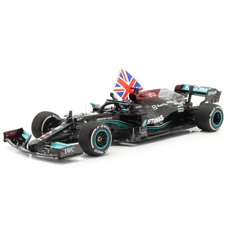 Minichamps 1/18 Mercedes AMG Petronas F1 W12 Winner British GP 2021 No. 44 Lewis Hamilton (with Flag & Driver Figure)