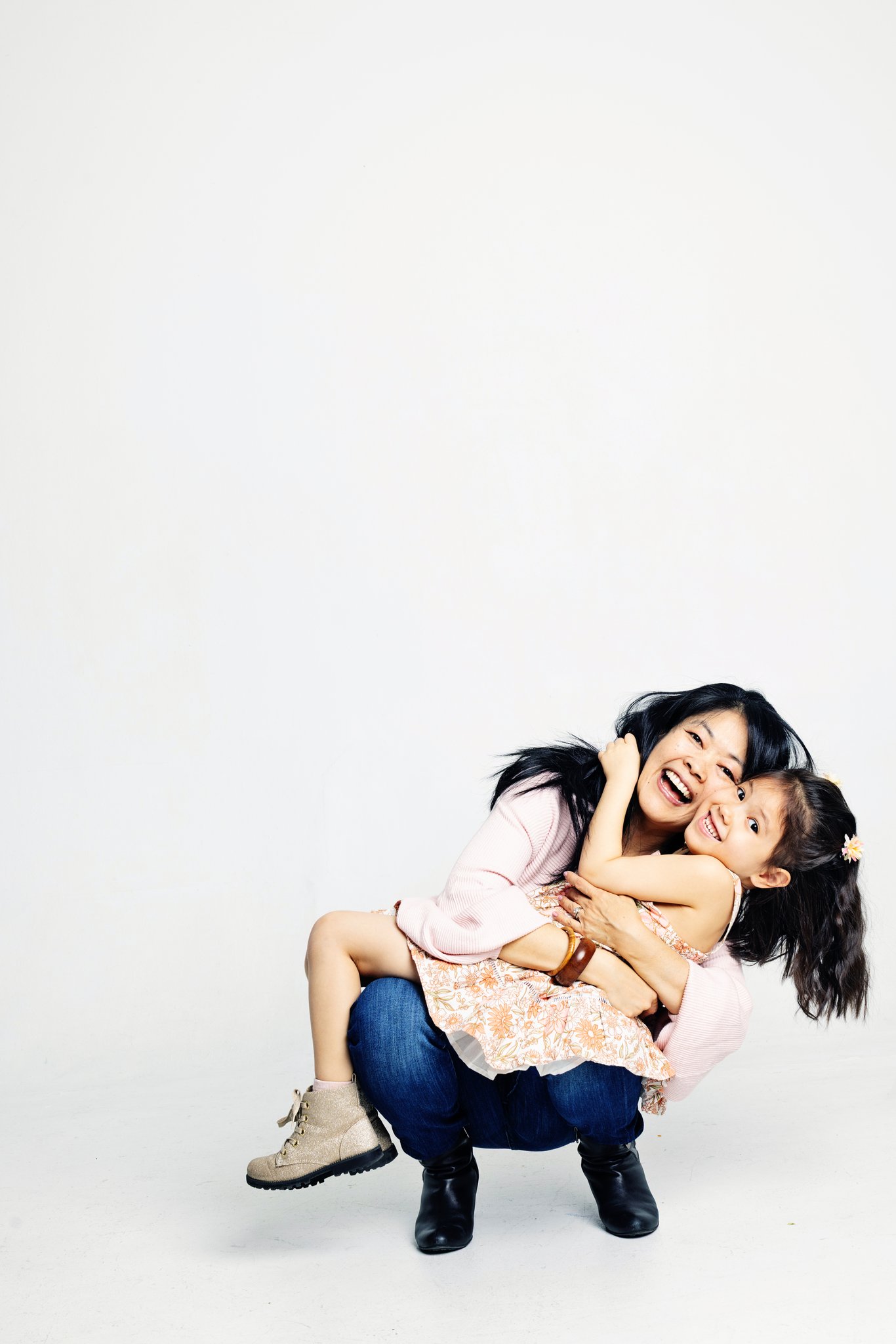 Daysee family portrait on white background