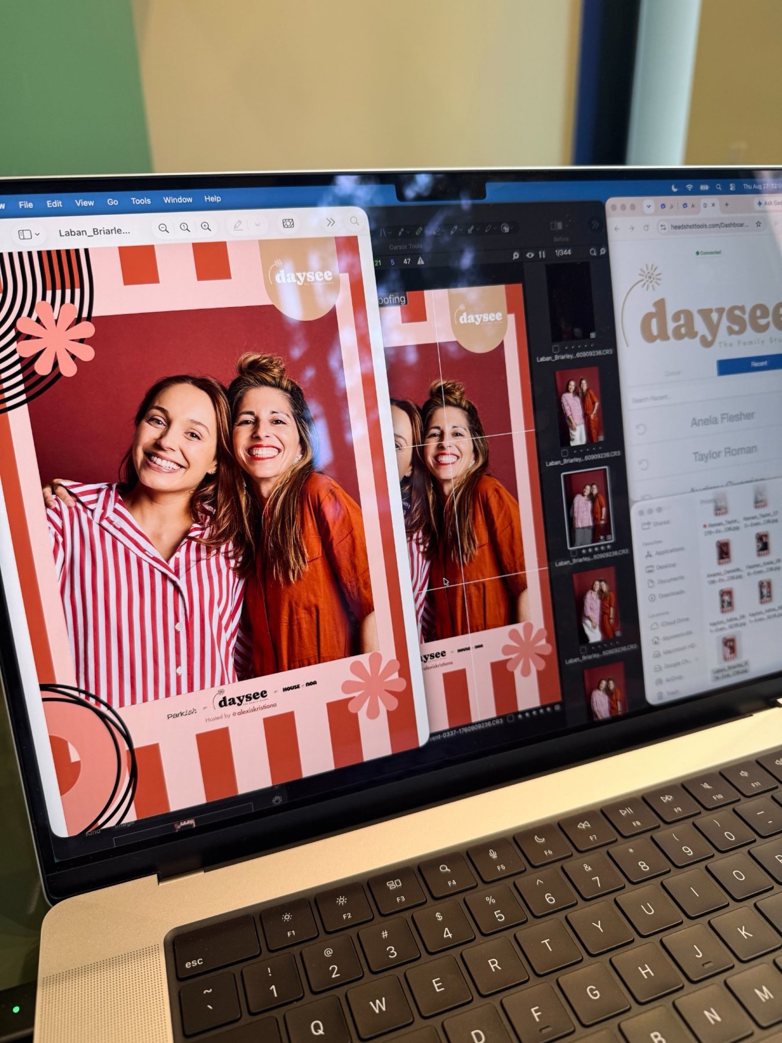 Branded portraits being edited on a laptop on site
