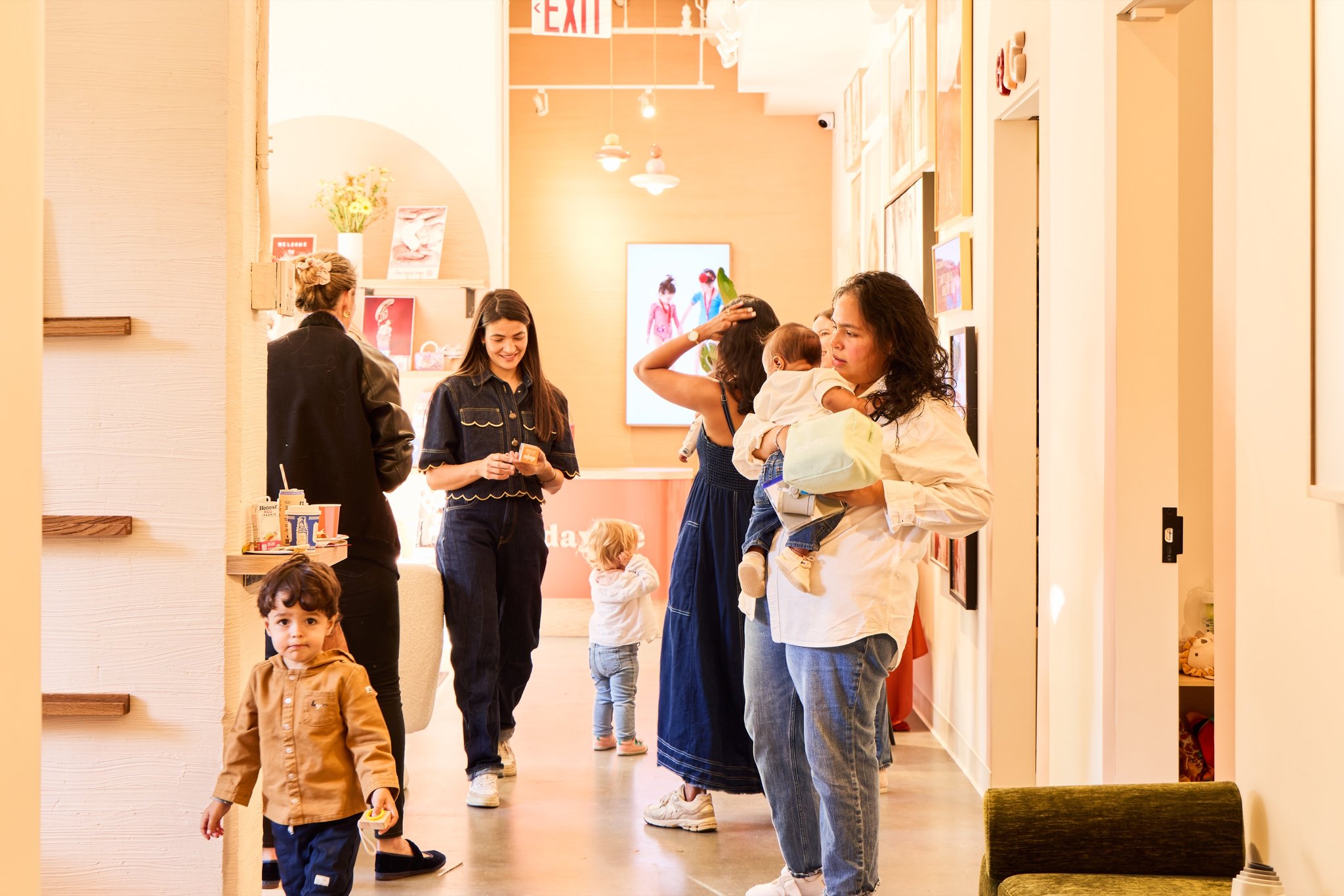 Families gathering in the studio hallway
