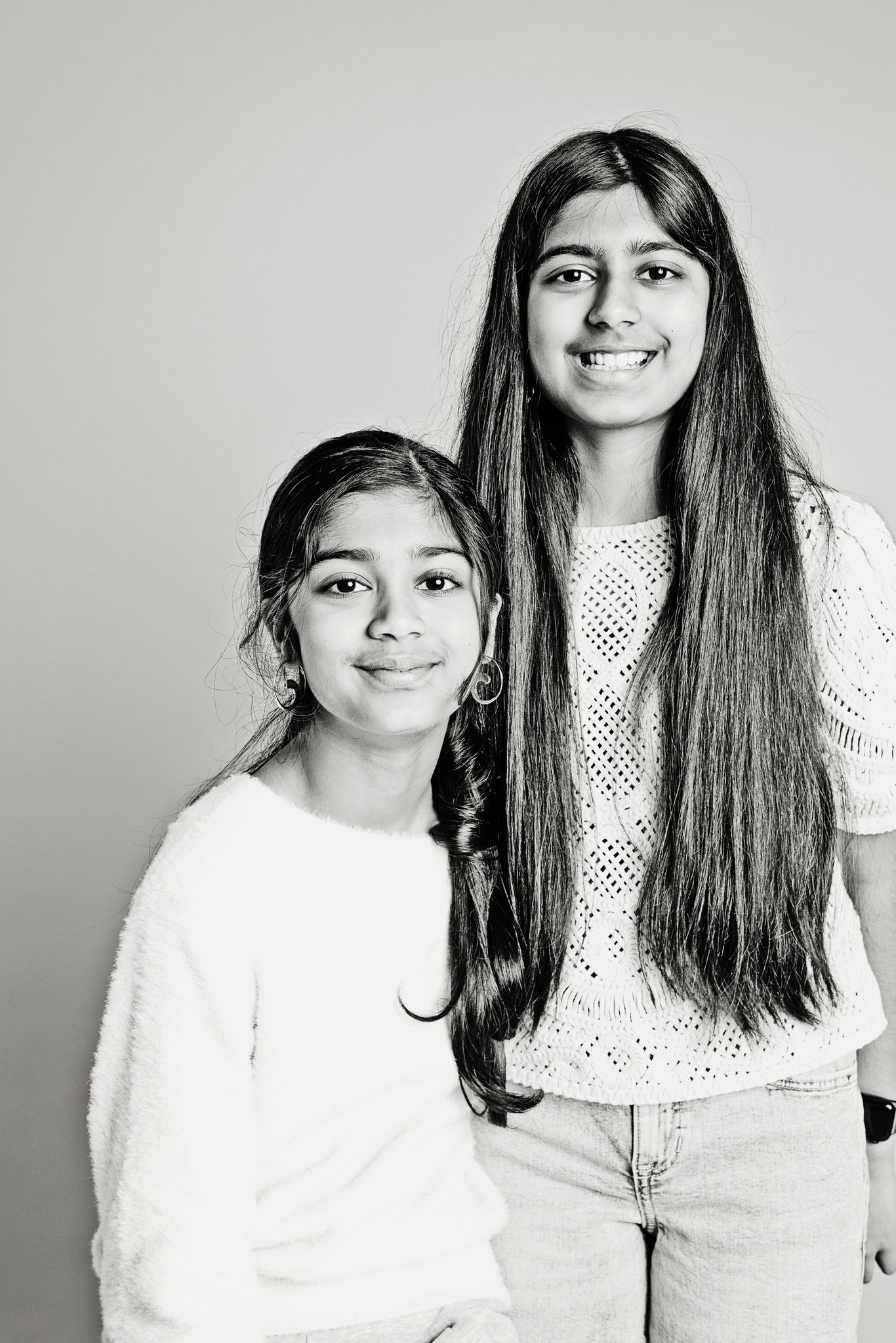 Two sisters in black and white