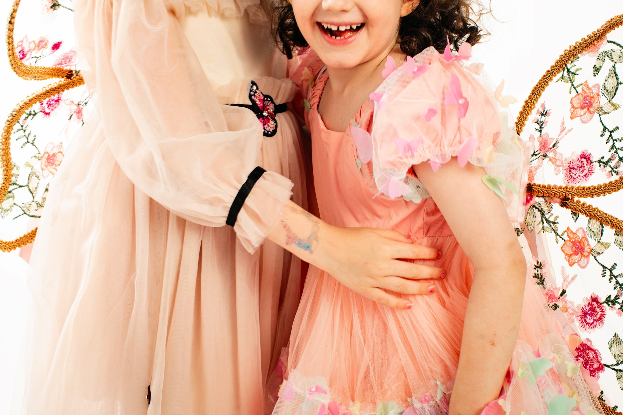 Two sisters in fairy costumes together