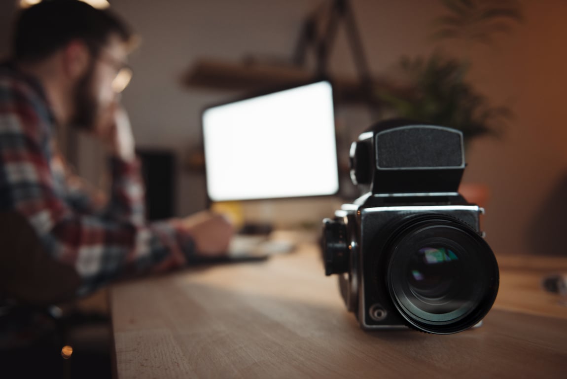 A content creator planning hotel marketing strategies through visual media