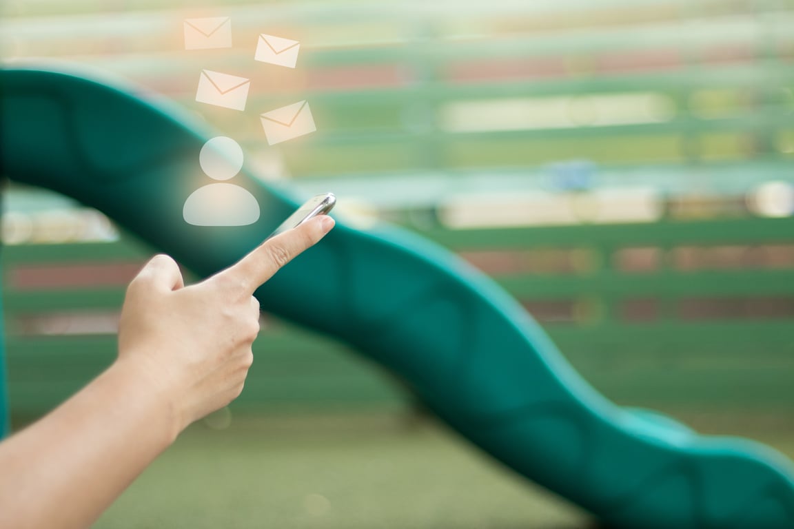 Finger pointing to floating email icons, representing need for individual consent under GDPR hotel email marketing rules