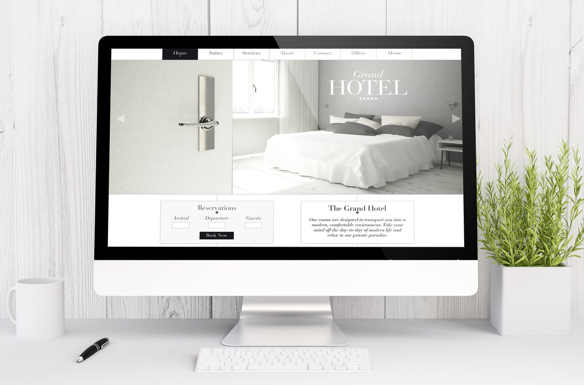 Elegant hotel website displayed on computer screen showcasing cohesive brand design