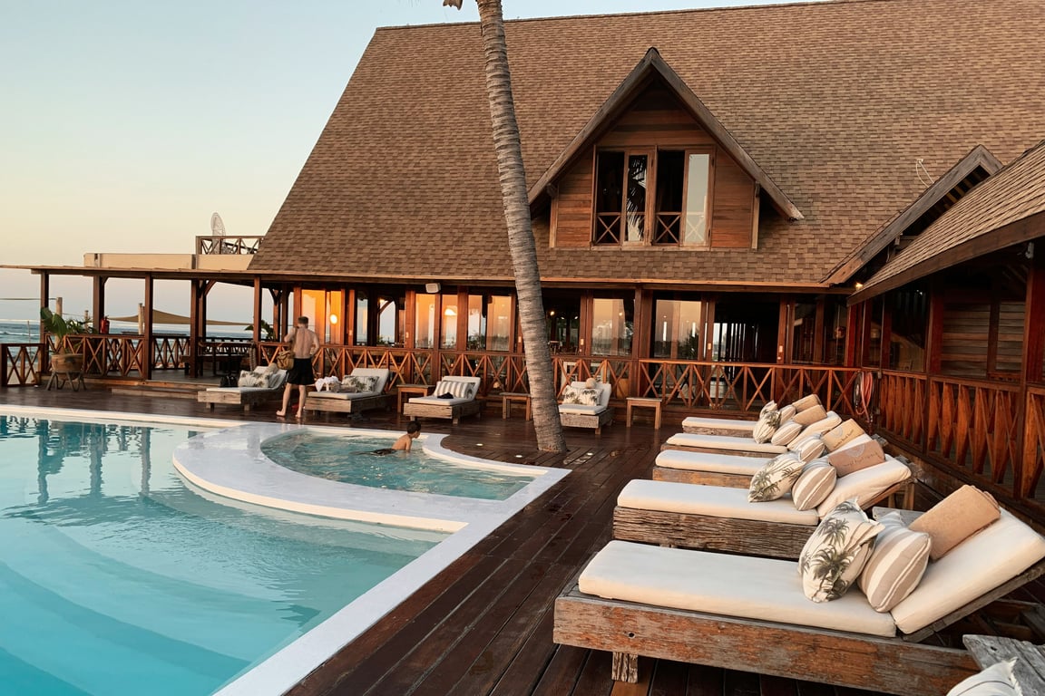 Resort poolside service showing attention to guest comfort and experience