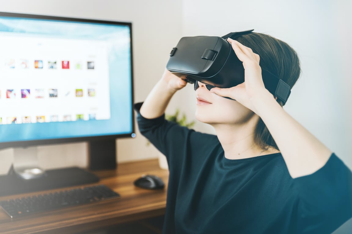 Person experiencing Virtual Reality with a headset