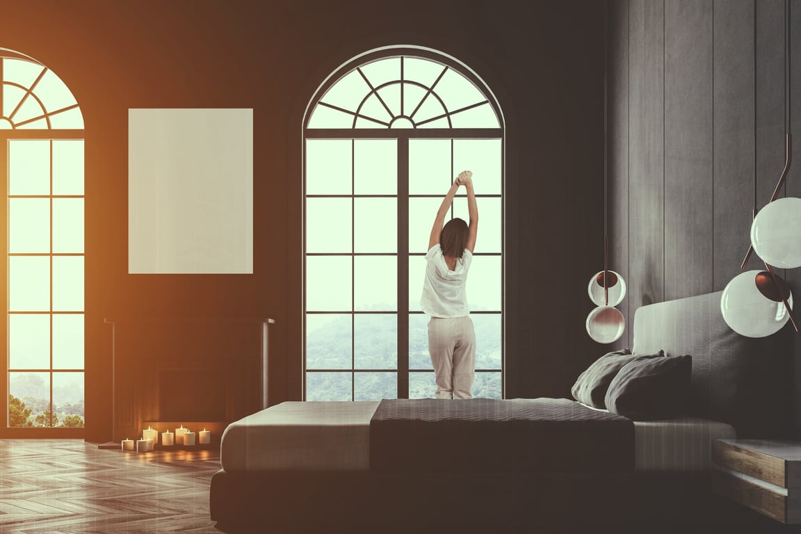 hotel guest stretching in high-end hotel