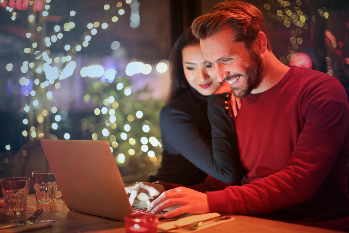 Hotel guests using a website booking engine to make a reservation