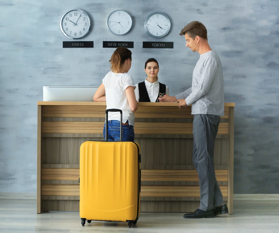 Guests using technology for a seamless hotel check-in process.