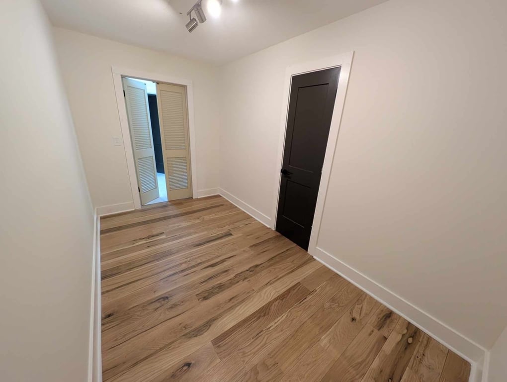 Modern Galley-Style Walk-In Closet before