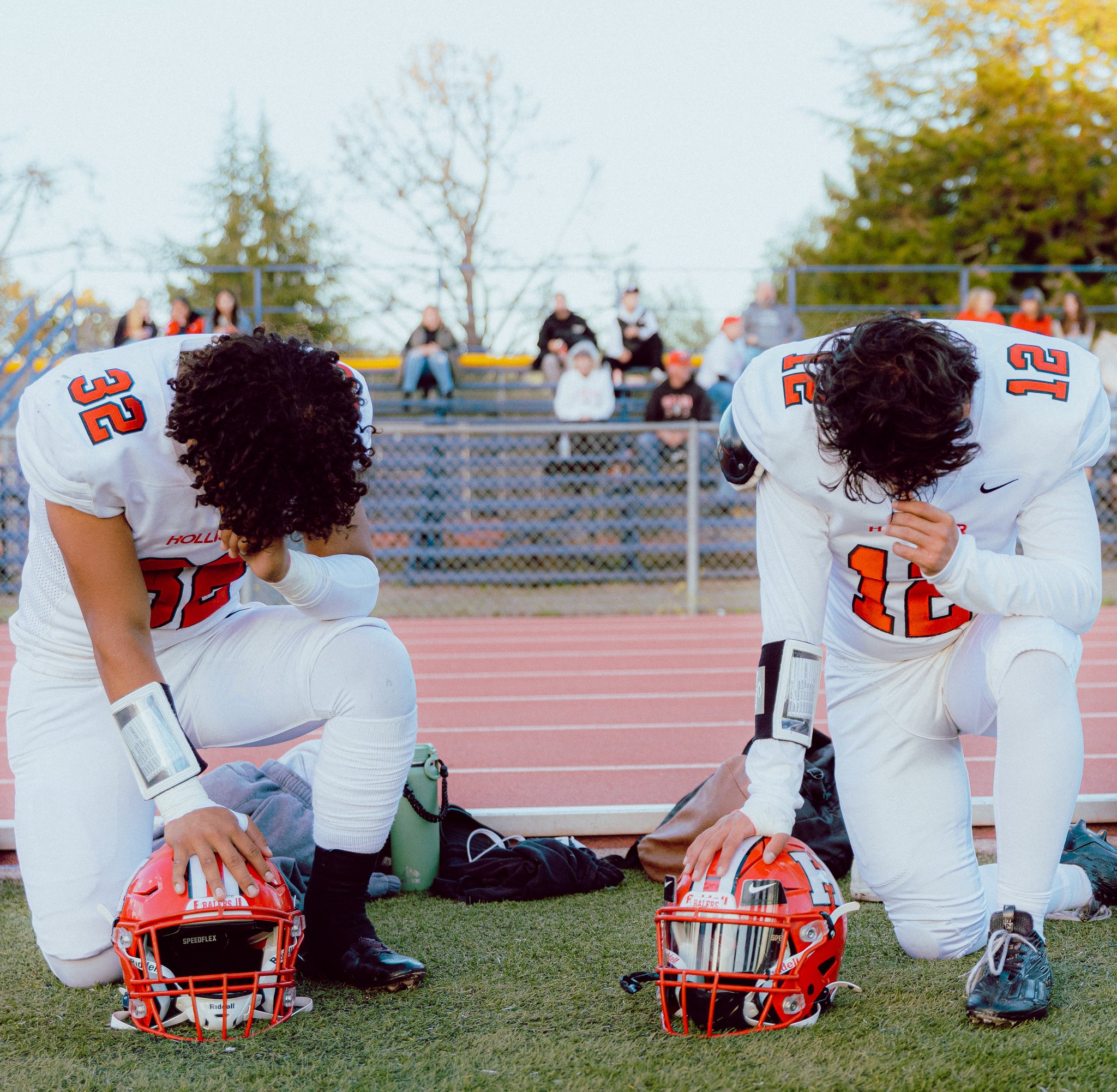 Football players kneeling
