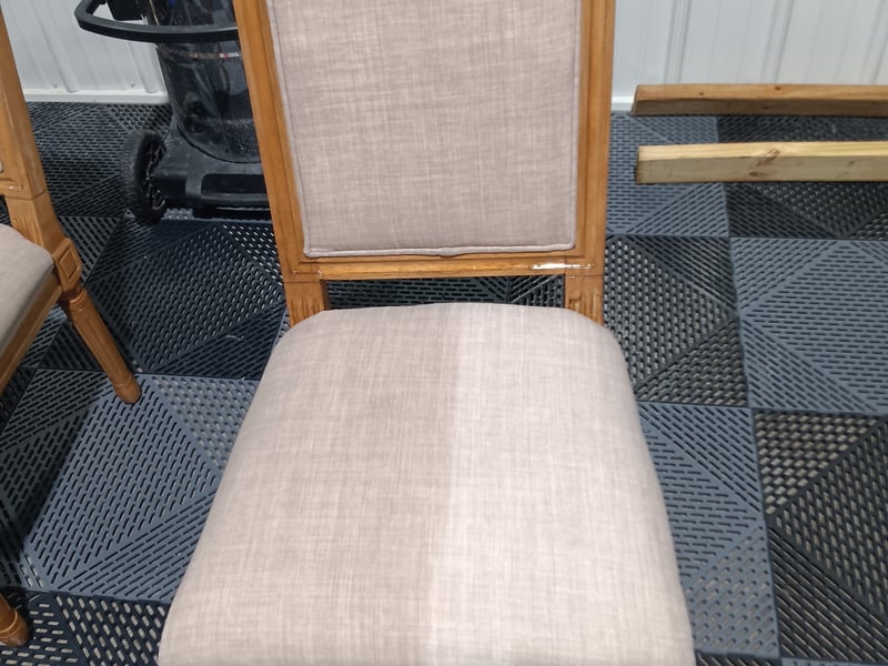 Upholstered dining chair being cleaned by Andrew's Pro Clean in Owatonna, MN
