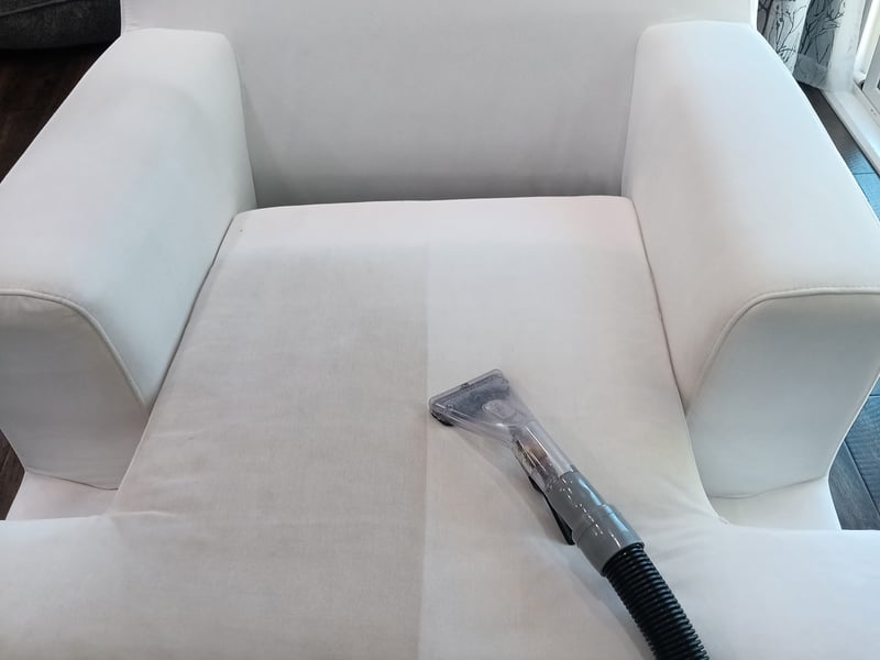 Upholstered armchair cleaned by Andrew's Pro Clean showing the difference, Owatonna, MN