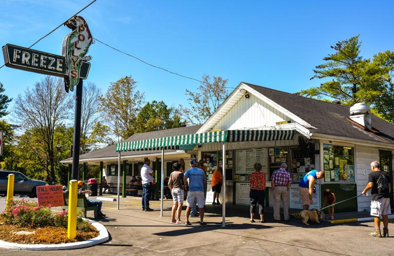 Customers lined up at the walk-up windows of Polly's Freeze, the longtime ice cream stand in Georgetown, Indiana.