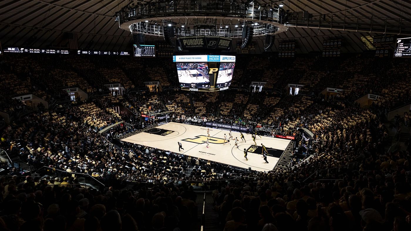 Packed Mackey Arena crowd watches Purdue play on Keady Court under the center-hung Purdue Boilermakers scoreboard