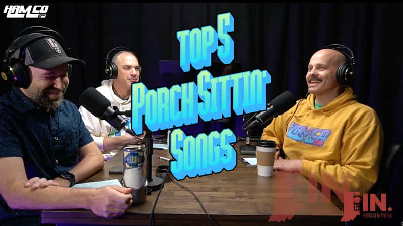 Three hosts of the HamCo Live Hot Ticket podcast talk at the studio table with microphones and headphones under a Top 5 Porch Sittin' Songs graphic