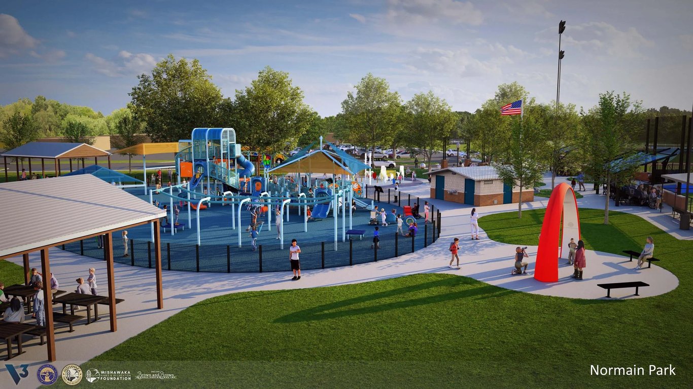 Rendering of Normain Park in Mishawaka showing the gated inclusive playground, shaded shelters, restroom building and the red Sona interactive play arch.