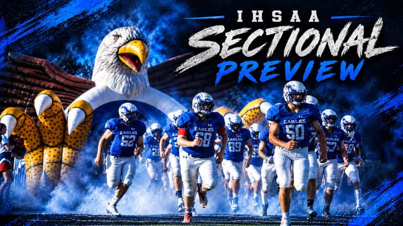 Football players in blue Eagles jerseys and white helmets run onto the field through smoke and an inflatable eagle tunnel, under an IHSAA Sectional Preview graphic