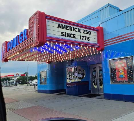 Fowler Theatre in daylight, its red marquee reading America 250 Since 1776 above a blue tile Art Deco facade