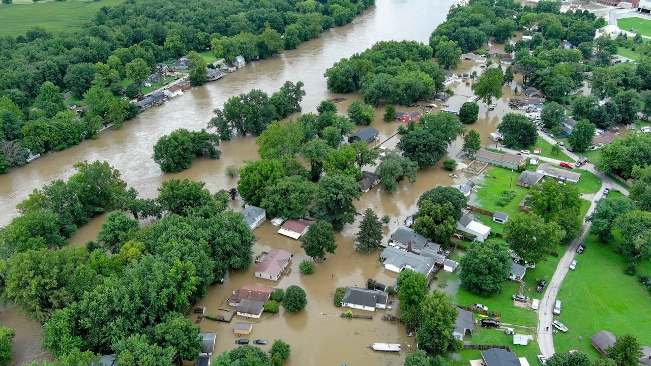 Flooded residential street near the White River corridor in Noblesville Indiana