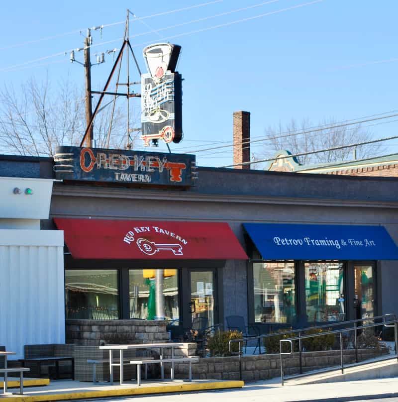 Red Key Tavern storefront with its red awning and vintage neon sign