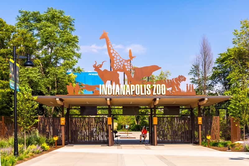 Indianapolis Zoo entrance gate with animal silhouettes above the sign