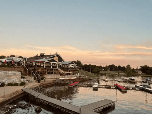 Boathouse Kitchen and Swan Dive and its boat docks on Morse Reservoir at sunset
