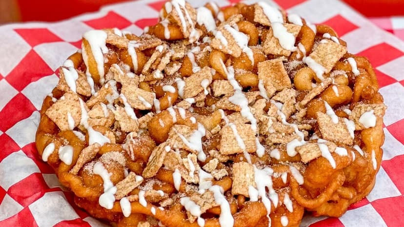 A close-up of a Cinnamon Toast Crunch-topped funnel cake at the Indiana State Fair