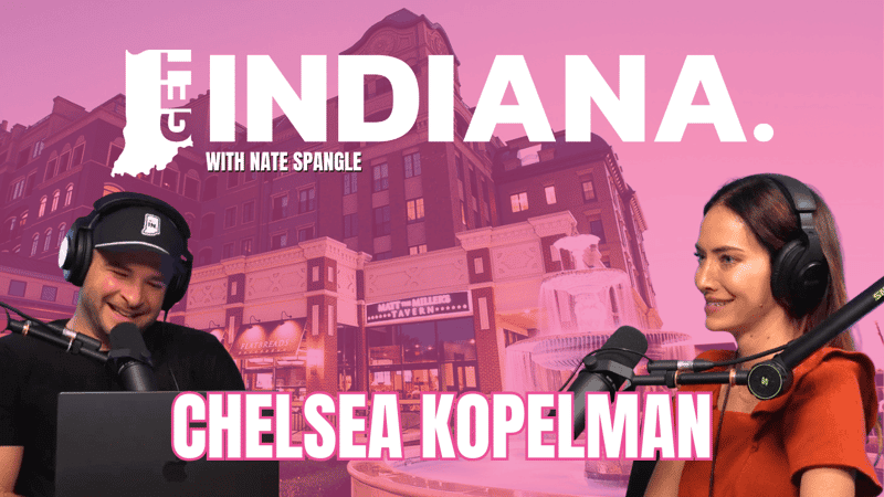Podcast hosts discuss local influencer networks against a backdrop of Indiana's historic architecture and fountain.