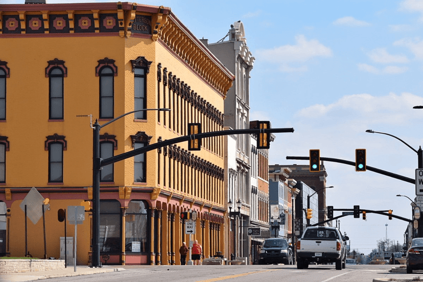Historic storefront buildings along a downtown Muncie street