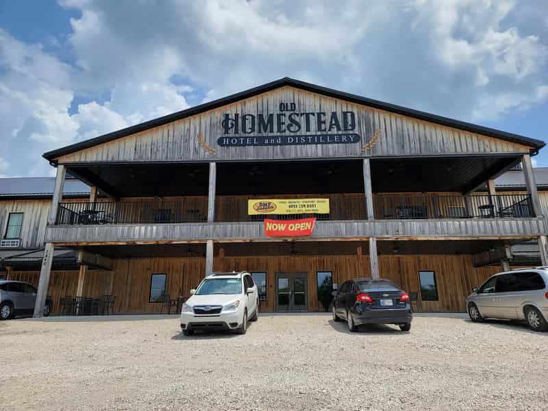 Old Homestead Hotel and Distillery's wooden front porch