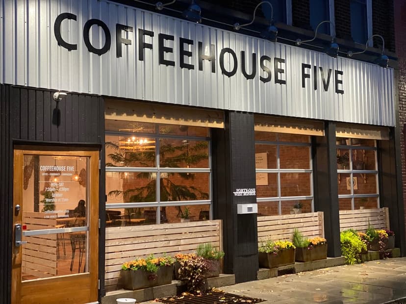 The Coffeehouse Five storefront with its metal marquee sign in downtown Franklin, Indiana